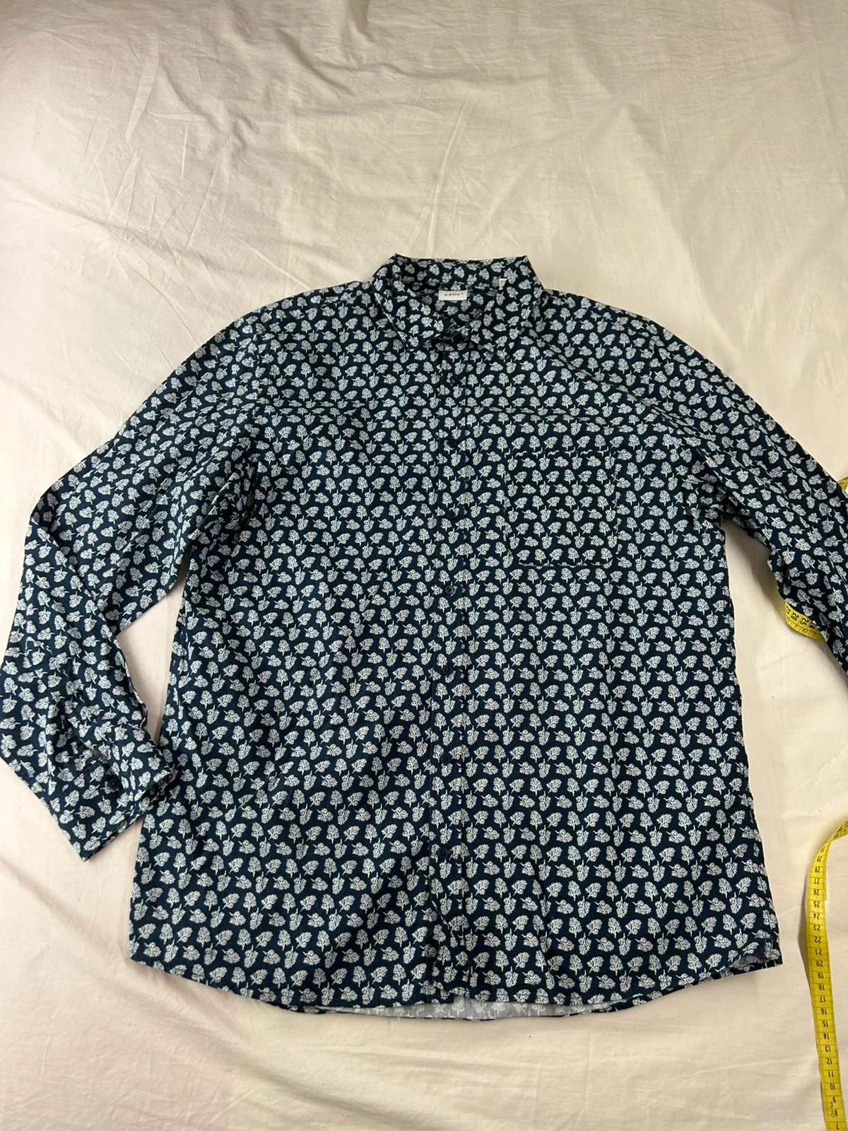 Chemise bleu marine celio à motifs blancs